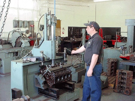 Man operating mechanical press