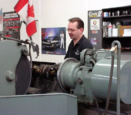 Man operating mechanical tool